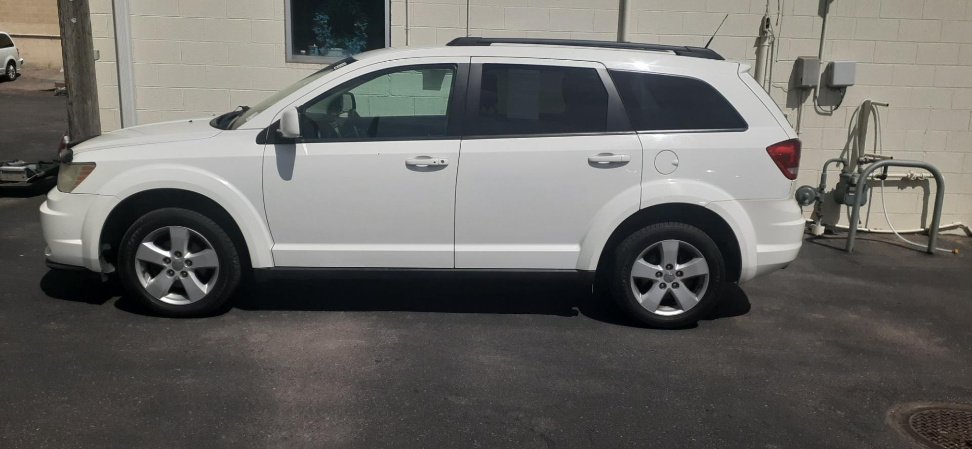 2011 Dodge Journey Mainstreet (3D4PG1FG2BT) with an 3.6L V6 DOHC 24V engine, 6-Speed Automatic transmission, located at 2015 Cambell Street, Rapid City, SD, 57701, (605) 342-8326, 44.066433, -103.191772 - CARFAX AVAILABLE - Photo#0